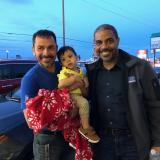 Rep. Horsford with a family in parking lot
