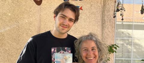 Son and mother holding passport