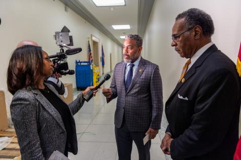 Congressmen Horsford and Cleaver speak in hallway.